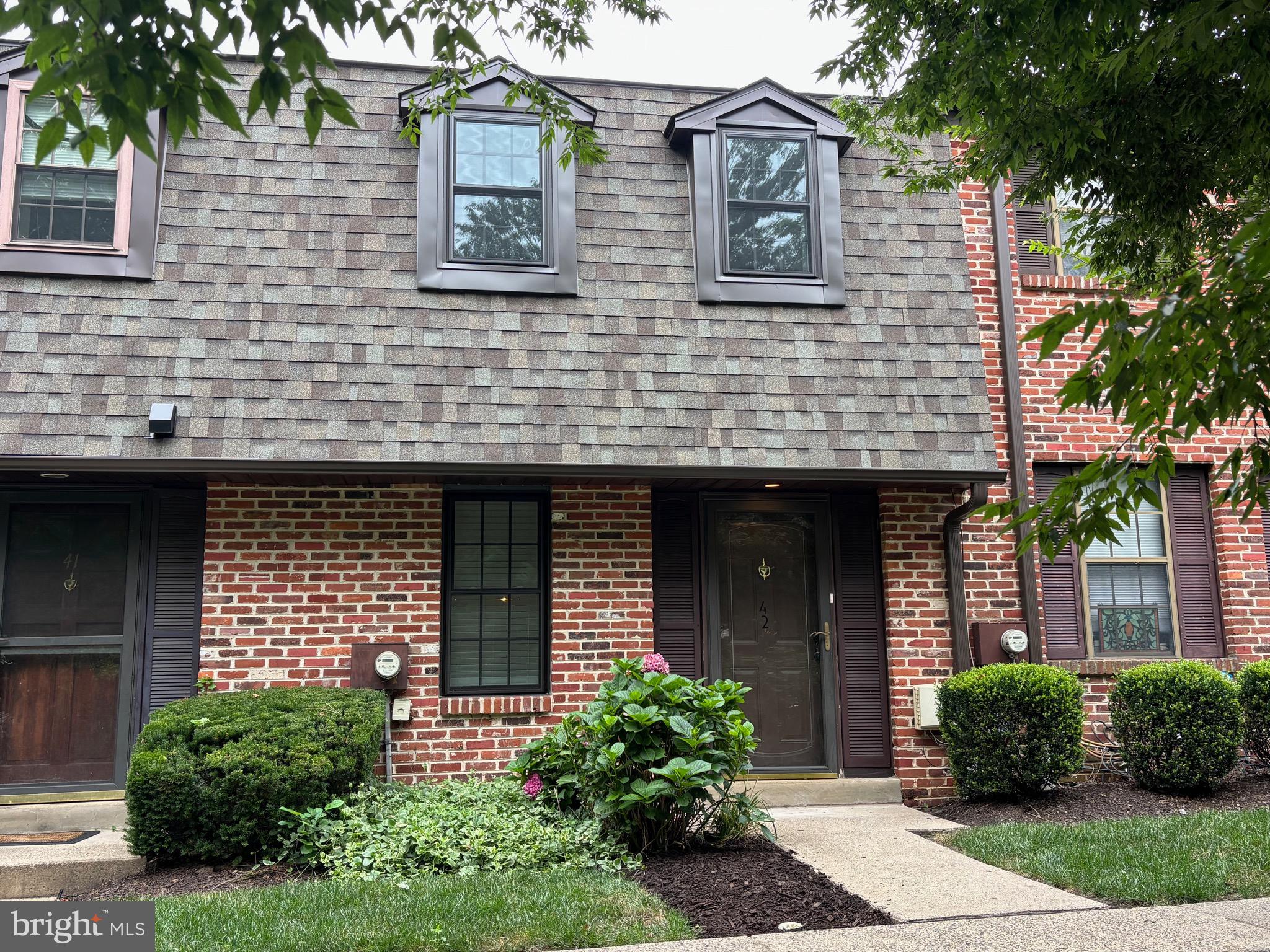 Welcome to this completely renovated, charming and elegant 2 bedroom, 2.5 bath townhome situated on a quiet cul-de-sac in a tranquil community within the Hatboro-Horsham School District. This townhome in Windsor Pass is as close to new construction as you can get! Step inside to discover a foyer entry with built-in bench and cubbies, a fully remodeled half bath and a gourmet eat-in kitchen. This custom kitchen includes shaker cabinets, granite countertops, subway tile backsplash, brand new stainless steel appliances and a range hood. The spacious, open-concept living and dining area are ideal for entertaining or relaxing. The living room is very comfortable with a built-in fireplace, crown molding and recessed lighting. The new waterproof and pet friendly laminate flooring throughout the entire first floor ties everything together. Upstairs you will find a large primary bedroom, complete with an en-suite bath for your comfort and convenience. The second bedroom is equally spacious and next to another full and beautiful bathroom. There is brand new carpet leading up the stairs and throughout the second floor. The lower level offers extra living space with a custom built in bar, perfect for entertaining. Step outside to the private rear concrete patio surrounded by trees, a perfect spot for morning coffee or evening relaxation. Other features of the property; ample attic space, brand new flooring throughout, paint, light fixtures, appliances, HVAC, newer hot water heater, all new windows and back door, new roof(2022), 2 deeded parking spots, visitor parking. Enjoy the blend of comfort and style in this delightful townhome in a prime location, convenient to Horsham business parks, schools, shopping, restaurants and parks.