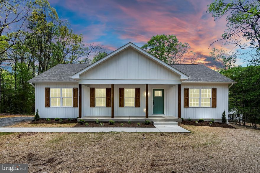 COMPLETED NEW CONSTRUCTION!  Beautiful 3 bedroom, 2 bathroom rancher on 3 acres. This home features an open floor plan, vaulted ceiling w/ wood beams in kitchen/living room, granite kitchen counter tops, stainless steel appliances, hardwood floors & tiled bathrooms. This home could qualify for 100% financing and comes with a one year Builders Home warranty.