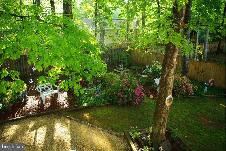 Single Family home for Townhome Price!  Large bedrooms! Sought after Montclair neighborhood! Super sized Master with on-suite bath. Mature landscaping, deck, privacy, access to everything Montclair has to offer.  Kitchen overlooking generous family room w/cozy fireplace.  S/S appl, brick interior wall, separate dining room, eat in kitchen. L/L rec room,with den and tons of storage space.