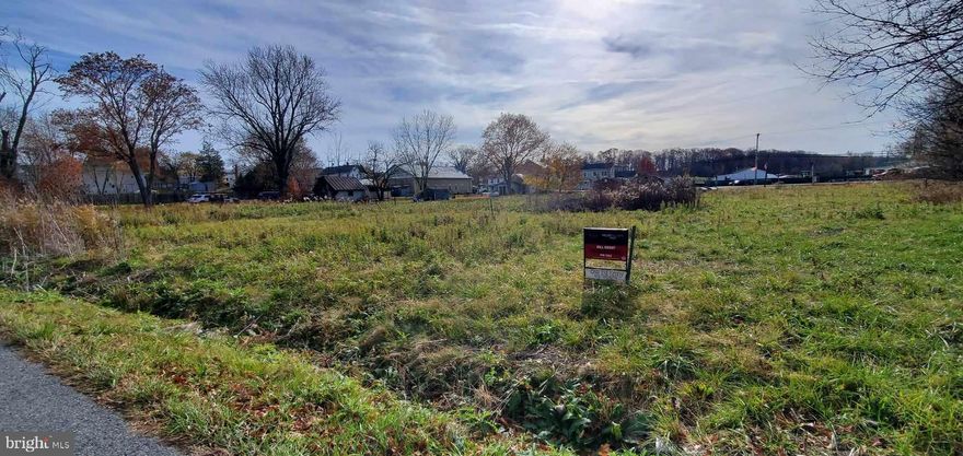 Libertytown Lot with Road Frontage on North St. Mulitple use options as its Zoned Village Center, allowing both commercial and residential uses.  Buyer to verify the feasibility of all uses. Currently the lot is empty and measures .33 acres.