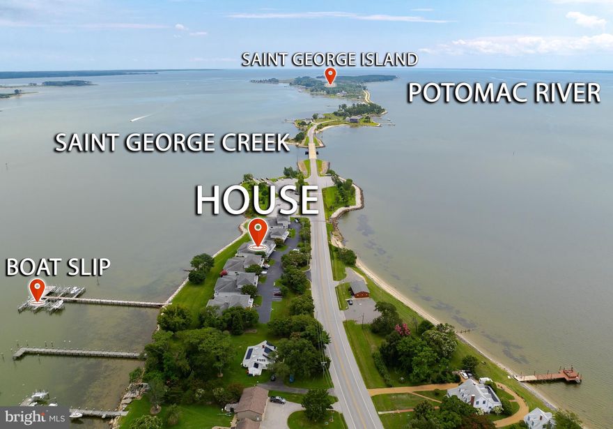 Welcome to your dream waterfront duplex! Wake up to the sunrise over St. George Creek and enjoy stunning sunsets over the Potomac River. This beautiful property features 3 spacious bedrooms, 2.5 bathrooms,  an inviting open-concept main living area, a delightful screened-in porch, and a coveted deeded boat slip! Step inside to discover the main floor, which boasts a luxurious primary bedroom complete with a large walk-in closet and an impressive ensuite bathroom. The heart of the home is the expansive kitchen, designed with modern living in mind. It flows seamlessly into an open-concept dining and living area, highlighted by a cozy gas fireplace, perfect for those cooler evenings. Adjacent to this space is a bright sunroom, where you can unwind while enjoying breathtaking views of the water. Upstairs, you’ll find two additional bedrooms, with a private balcony overlooking the river—an idyllic spot for watching stunning sunsets with your loved ones. This home also features a generous two-car garage, a convenient laundry area on the main floor, and a spacious pantry to meet all your storage needs. As well as an easy access storage area in the attic. For water lovers, this property comes with a deeded boat slip equipped with a boat lift, making it easy to embrace the waterfront lifestyle. Enjoy easy access to a nearby restaurant, a boat ramp, and a community park, all just minutes away. This is not just a home; it's a gateway to a vibrant and relaxing lifestyle by the water! Don't miss your chance to make it yours!