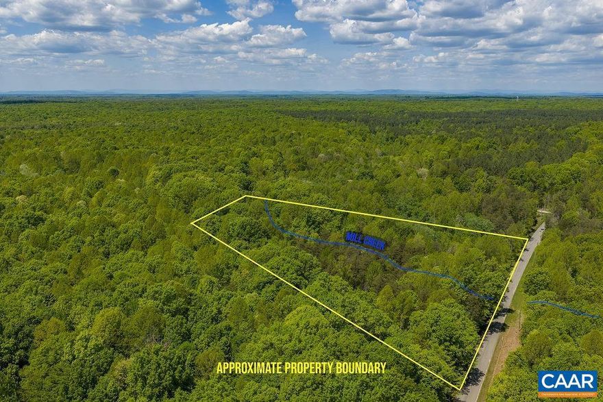 Discover the perfect blend of privacy, nature, and convenience with this beautiful 11.38-acre property. Ideally located just 12 minutes from I-64, it offers an easy commute in either direction while still providing a peaceful, secluded setting.   The land features a gentle slope and is covered with a mix of mature hardwoods, creating a picturesque natural landscape. A lively, year-round stream?Mill Creek?runs through the property, adding both charm and potential for a truly special homesite.  With approximately 720 feet of road frontage, there?s plenty of flexibility for access and layout. Whether you envision building your dream home, creating a private retreat, or even adding a pond, this property offers endless possibilities to enjoy nature and quiet country living.
