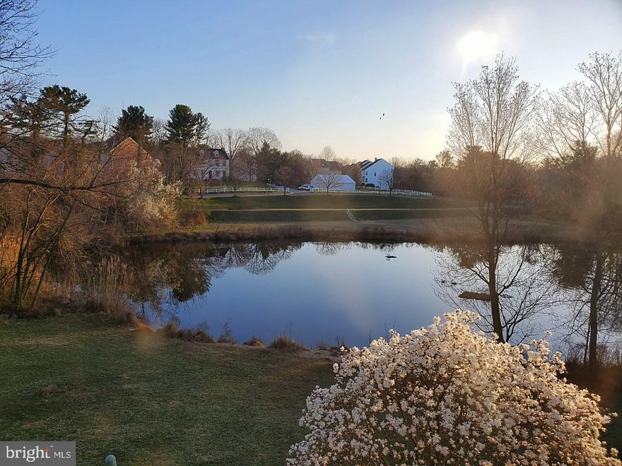 WELCOME HOME!!! This sun-filled and over sized townhouse is ready for its new owners!  Boasting 4 Bedrooms, 3 1/2 Baths and 3 Finished Levels with WATER VIEWS!  YES THAT'S RIGHT and from ALL three levels and the best views in the neighborhood.  The entire house has new carpeting, new windows and fresh paint throughout; Bathrooms offer pristine tile showers, new ceramic floors, toilets and vanities.  You'll enter a ceramic tiled foyer with a full sized coat closet and step right up to the main level which leads you to a spacious table space kitchen with stainless appliances, new floors, new counters and new cabinets; a table space dining room flows right into an open living room with a fireplace and perfect views of the pond, a walkout slider takes you onto a huge deck perfect for morning coffee or weekend family gatherings; The upper level offers a spacious master suite with vaulted ceilings, lots of natural light, walk-in closet with built-ins, a master bath with dual vanity and soaking tub & shower; The upper level also offers two additional spacious bedrooms with water views and another full bath in the hallway;  The lower level is also finished and offers a large family/tv/entertainment area, walk-out to the lower patio and more water views, tons of storage, large laundry room (not closet), fourth bedroom and third full bath; this area can be closed off for privacy and is perfect for house guests, a nanny/au pair or used as an in-law suite.  This house is perfectly situated in the back of quiet horseshoe shaped street, just minutes from Blandair Park, Routes 29 & 175, shopping and so much more!  Hurry, this like new townhouse  won't last long!!