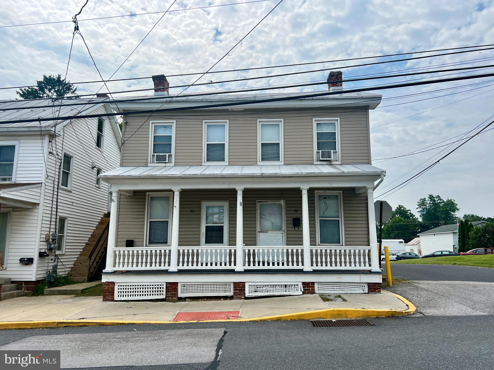Fantastic Investment Opportunity in Littlestown! This fully occupied duplex offers immediate income with two well-maintained 2-bedroom, 1-bath units. Each unit features a functional layout, separate entrances, and comfortable living spaces. Tenants enjoy the convenience of private off-street parking located in the rear of the property. Located close to schools, shops, and commuter routes, this is a solid addition to any investment portfolio. Don’t miss your chance to own a low-maintenance, income-producing property in a desirable Littlestown location!