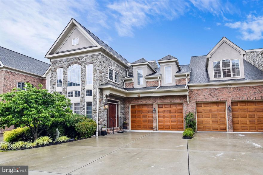 Original Dale Thompson villa @ Scot’s Glen 55+ community. Walls of windows in the front living room and the rear family room. With the open floor plan, you can see from the front of the house to the trees outside the back deck. Relax in your favorite chair and enjoy the natural sunlight flooding in around you. Chat with guests in the formal dining room or with those gathered at the bar & family room while you are  in the gourmet kitchen. Flip on the gas fireplace in the family room & remove the chill from sitting on the deck. The spacious main floor primary suite has a walk-in customized closet, bath with dual sinks and walk-in shower with dual shower heads. The powder room and laundry complete the main floor. The laundry has  full-size washer & dryer and a storage closet. Upstairs, the hardwood floors in the loft make a perfect entertainment area overlooking the family room. The Jack & Jill bath with hall entry from the loft serve the upper level 2 bedrooms & den. Both bedrooms are over-sized and could be a 2nd primary suite with walk-in closet. The spacious Lower Level has a rough-in for a future bath; lots of space to add a bedroom / bar / other room, large utility room and separate storage room. The villa allows easy handicap access with no steps from the garage & though-out the house. The elevator will transport you from the basement to the top floor. The hardwood floors provide even footing. Enjoy living at Scot’s Glen. The location has easy access to medical facilities, shopping, entertainment. close to route 32 & I-95.