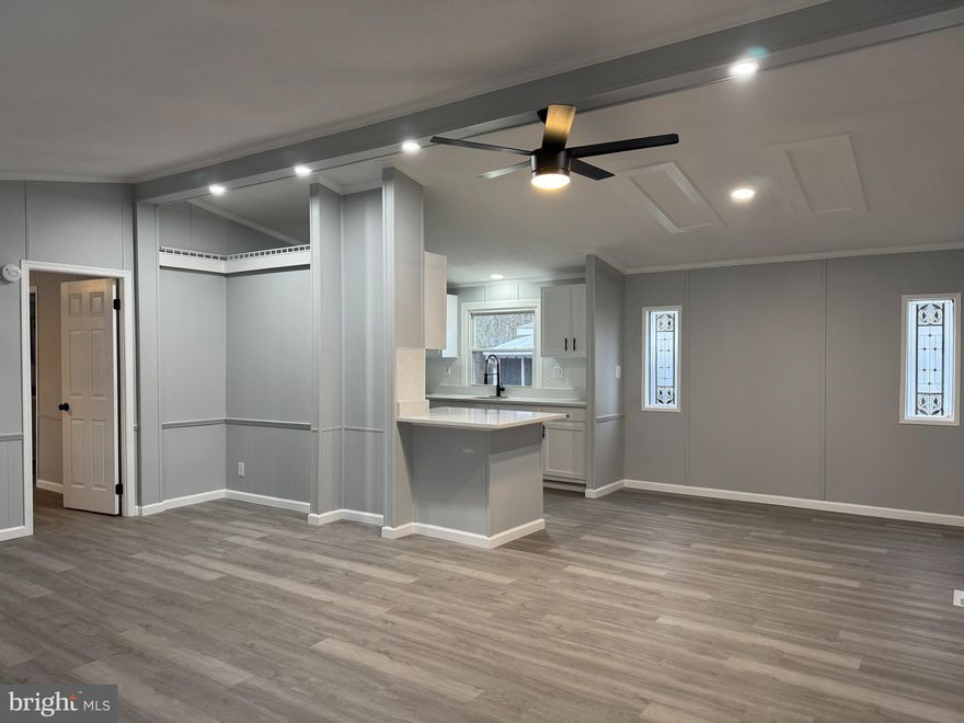 Charming double wide white and red mobile home with a matching shed. This home is situated on a dead-end street and is the second house in from the woods. The lot rent in this park is affordable compared to nearby options. There is a matching shed that comes with the home and has electricity. This is a clean and quiet community—what more could you ask for?

Lot rent is very affordable for the area at $795/month. Schools are zoned to Sparrows Point
Hablo en espanol! Owner Financing available with qualifying deposit.