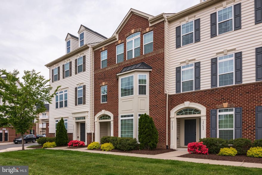 **PLEASE see Video/Virtual Tour** Gorgeous, 2 level Townhouse Condo in sought-after Arcola Town Center!!  Directly across from South Riding & Conveniently located NEXT to Dulles Landing Shops and restaurants with connecting road in progress.! 2 beds/2 bath w/ cozy, upper level family room/den could EASILY be converted to 3rd BedRoom! Huge master suite with TWO walk-in closets, gorgeous, upgraded master bathroom w/ oversized walk-in shower & dual vanity, Upper level laundry, Rear garage and veranda/balcony, playground and common area view from front bay window, plenty of guest parking and Dulles Landing shops just blocks from front door. Community pool & clubhouse. Call/Text ALT AGENT Cyndee Carr  w/ questions!  VIRTUAL TOUR ---> https://www.dropbox.com/s/qz9vo8lxov72yrr/24606%20Johnson%20Oak%20Terrace%20Video.mp4?dl=0