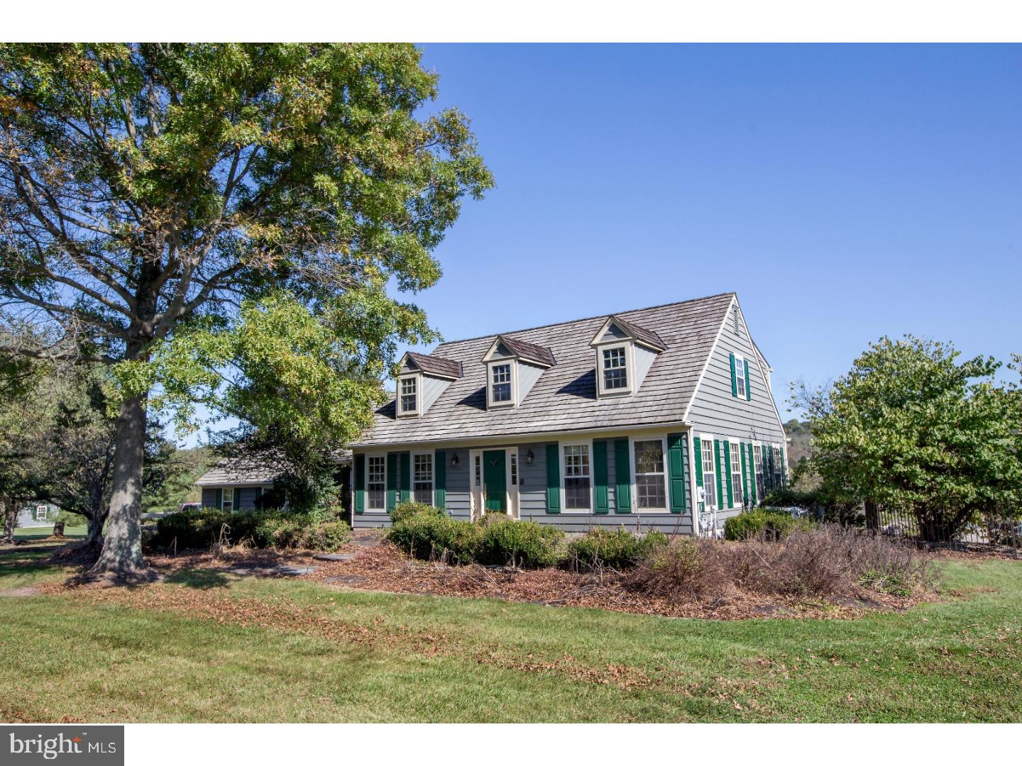 Panoramic views of Jericho Mountain in bucolic Upper Makefield Township, this finely built Ferman Lex Cape is situated in a prime location amongst the fine estate properties of Eagle Rd. A view out of every window awaits, pastoral charm in all directions. Enjoy the changing of the seasons from the large deck which runs the length of the main floor living areas, shaded by a pergola and just steps from the in ground pool with waterfall. A full eat-in kitchen with breakfast room is adjacent to the formal living and dining rooms, and the first floor office with full bath was originally a bedroom and could make a great main-level master. Upstairs, the three bedrooms all overlook the rear pasture, and the master suite offers a walk in closet and full bath with Jacuzzi tub. Finished lower level adds bonus space and a staircase to the attached garage. Bring your hobbies/animals to the fenced pastures and barn with two stalls, tack room, hay loft, and feed room. An over-sized, detached equipment garage can fit a car collection or farming equipment, and has a two bedroom apartment above (presently prepped for remodel), great for passive income, long term guests, or in-law accommodations. A lovely Bucks County setting in Council Rock School District and just minutes from NJ & I-95.