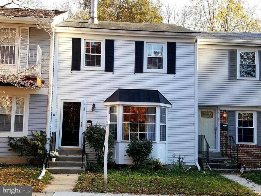 This town home has been beautifully renovated! Beautiful 42" cabinets, granite counters, stainless appliances, bamboo hardwood flooring, fresh paint and new carpet. Eat-in kitchen and a wood burning fireplace make this home warm and inviting. Master BR has its own bath/vanity. Fully finished basement w/ back yard facing a wooded/protected area for privacy.This home is a must see and will not last!