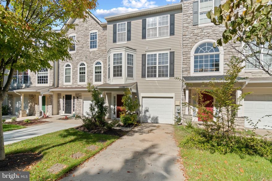 Beautifully updated 3-level townhome located in the Russett community of Laurel, Maryland. The seller is offering a $2000 credit toward new appliances! This stunning one car garage unit has new carpet throughtout. The entire interior has been freshly painted. Enjoy three bedrooms and two full bathrooms on the upper level. The main level is complete with spacious kitchen, half bathroom, fireplace and open dining room that flows into the living room. Walk-out the sliding glass door to a rear deck overlooking the common grass area. The lower level offers a separate family room, play area or office with a door leading to the rear yard. The community amenities include pools, tennis, basketball and volleyball courts, tot lots and community trails. This ultra convenient location is right around the corner from 295, 198 and I-95 and a short drive to Ft Meade, NSA, NASA Goddard, BWI, Arundel Mills, FDA in Laurel, Annapolis Junction.