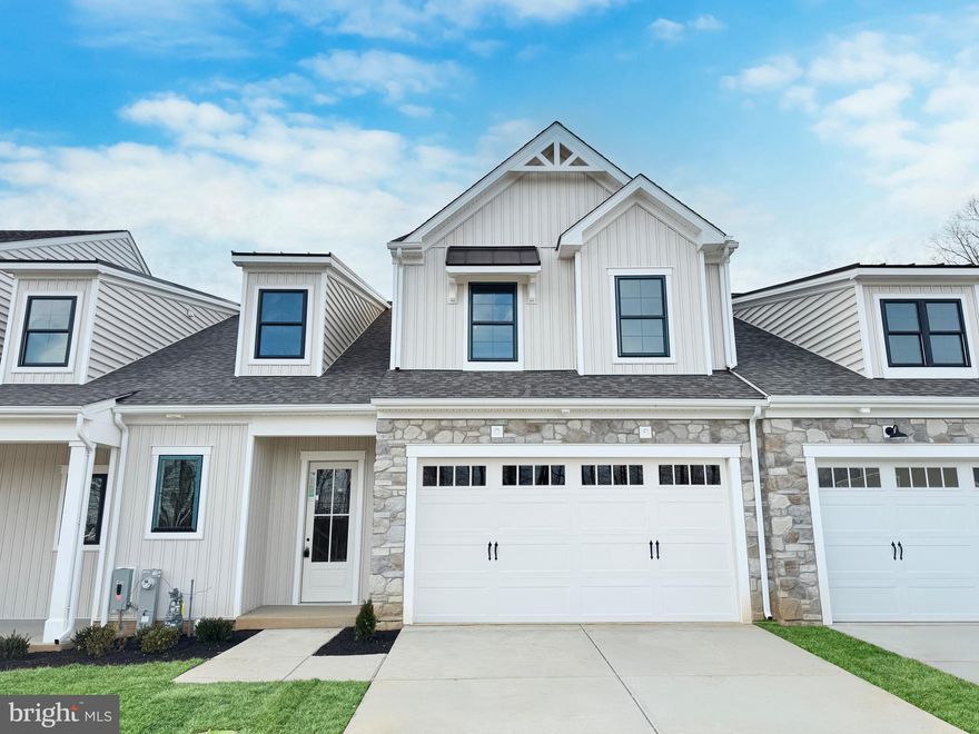 These luxurious 3-4 bedroom Villas in the exclusive gated community of Bulle Rock are waiting for your finishing touches. The photos shown are from a detached version of the new Chase villa model. This stunning residence boasts unparalleled elegance and modern sophistication, offering a lifestyle of comfort and refinement. The gourmet kitchen is a culinary enthusiast’s paradise equipped with top-of-the-line appliances, custom cabinetry, and expansive countertops. Ideal for both everyday meals and lavish entertaining. Embrace a sustainable lifestyle with state-of-the-art energy-efficient appliances and systems that ensure both eco-friendliness and cost savings, including argon-filled low-e windows, high seer-rated air conditioning systems, fresh air make-up, whole-home humidifiers and more. The inviting living area features a cozy gas fireplace, perfect for relaxing evenings and creating a warm ambiance throughout the year. Customize your space with an optional finished basement—ideal for a home theater, gym, or additional living quarters as needed. Optional lots that feature pond or wooded views. Enjoy the security and tranquility of a gated community offering premium amenities and a sense of belonging. Including indoor and outdoor pools, a full gym, tennis and pickleball and more! Experience the epitome of luxury living with this exceptional villa—where every detail is customizable and crafted to perfection.