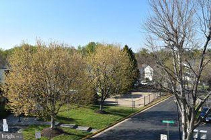 Great split floor plan.  Within walking distance to commuter lot, shopping, dining and public transportation.  New carpet, fresh paint, new range, microwave, dishwasher and garbage disposal.