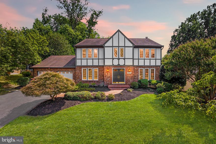 A Tudor that blends classic architecture with modern living across three fully renovated levels.<p>

Step inside the formal foyer and you immediately feel the character of this home. To the right, a sunlit living room invites quiet evenings or conversation with friends. To the left, a dining room with room for a full table—ready for holiday dinners and weekend gatherings.<p>

Down the hallway, the layout shifts from traditional to open. The renovated kitchen is the centerpiece, with a large peninsula that doubles as a gathering spot for morning coffee or casual meals. From here, the space flows directly into the family room, where a wood-burning fireplace adds warmth and character. French doors extend the living area to a screened porch overlooking a garden that has been cared for season after season—an outdoor retreat you can enjoy without leaving home.

Hardwood floors carry throughout the main level, leading you upstairs where four bedrooms provide space for everyone. The primary suite features a walk-in closet and a spa-inspired bath with double vanities and a large shower. A second renovated bath serves the additional bedrooms, updated with clean, modern finishes.

The lower level is designed for both relaxation and entertaining. A large open area with a bar sets the stage for movie nights, game days, or gatherings that run late into the evening. A full bath and an additional bedroom complete the space—perfect for guests or a quiet home office.

Set in a Vienna neighborhood known for its convenience, the home is just half a mile from Wolftrap Elementary school, 1.3 miles from Meadowlark Botanical Gardens, 1.5 miles from Wolf Trap National Park for the Performing Arts, and close to downtown Vienna, Tysons', and major routes.