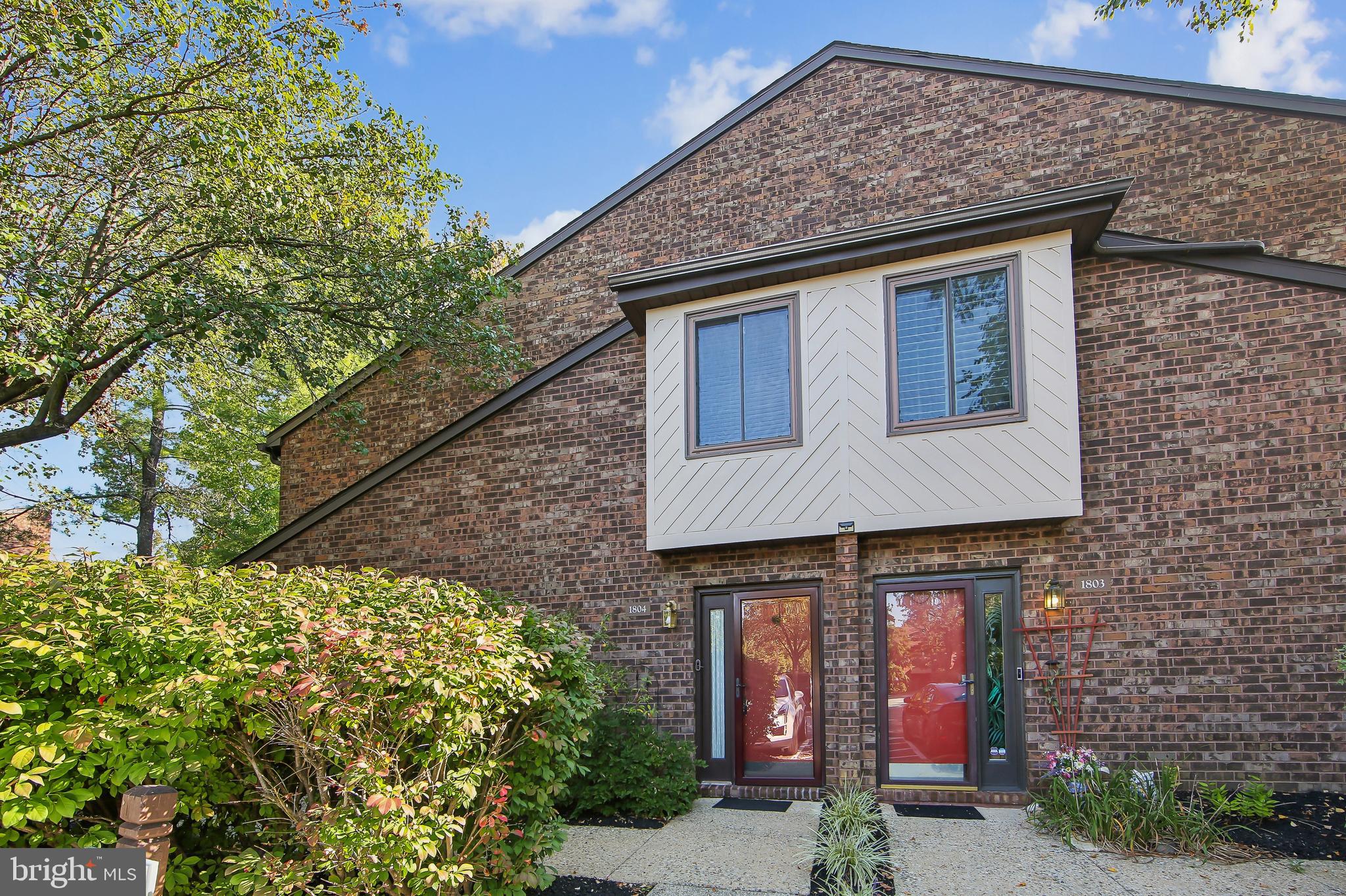 Welcome to 1804 Mountain View Drive, a fantastic, wonderfully updated first floor two bedroom condominium in the highly sought after Mountain View community of beautiful Chesterbrook. Freshly painted and brand new flooring throughout. This pristine home is in perfect move-in condition. No steps at all! Park directly in front of the home and step right in. The foyer entrance opens into the large living and dining room area , crown molding, a gas fireplace and expansive sliding glass doors leading to a lovely patio area. The updated kitchen offers updated raised panel cabinetry, granite countertops, a stainless steel sink, recessed lighting, tile backsplash and an open pass through to the living room with a convenient breakfast bar. The spacious primary suite features three huge closets with abundant storage and a ceiling fan. The primary bathroom is handicap accessible featuring a tiled sitting bench and grab bars. An additional nicely sized bedroom/den/home office, full hall bathroom and spacious laundry room with cabinetry complete this wonderful home. The patio is the perfect place for outdoor grilling, dining and relaxing. Two outdoor storage closets. Enjoy maintenance free living at its absolute best, all on one level. An ideal home in perfect condition with NO STEPS. Close to Chesterbrook Plaza, Wilson and Valley Forge parks plus the shopping, restaurants, corporate centers and trains of the Main Line. Located in the top-ranked Tredyffrin-Easttown School District.