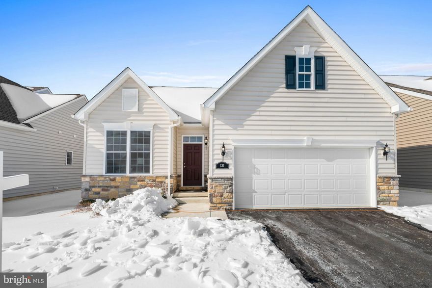 QUICK DELIVER - Skip the wait with this quick delivery home located in the highly sought after Village of East Ridge, a vibrant 55+ active adult community designed for easy, low maintenance living. The popular Bayard Classic floor plan offers 1,684 sq. ft. of single level living with two bedrooms and two full baths. Inside, enjoy a bright, open layout featuring an expanded great room and dining area that flows seamlessly from the spacious kitchen - perfect for everyday living or entertainment.  The main level primary suite includes a private study/sitting room, providing a quiet retreat or a flexible workspace. A 2-car garage and full basement offer ample storage and future potential. Enjoy resort style amenities including a clubhouse with fitness center, 34 acres of open space, walking trails and a welcoming neighborhood feel. Schedule your tour today and move in without the wait.