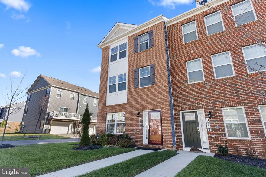 Welcome home to this stunning brick-front, semi-detached townhouse in the sought-after neighborhood of Woodmore Overlook. This rare end-unit townhome in the development has 3-bedroom, 2.5-bathroom accross 3-levels with modern details like stainless steel appliances, granite countertops, hardwood flooring, custom ceiling fans, and smart home technology. The open-concept floorplan on the main level along with the half bathroom is convenient for seamless entertaining.  The kitchen is a perfect fusion of functionality and style, equipped with expresso cabinetry, white countertops, large kitchen island, gas range stove, dishwasher, and double-door refrigerator. Step out onto the deck off the kitchen which provides the perfect spot to sip your morning coffee or relax after a long day. Retreat to the lavish owner’s suite on the upper level with an en-suite bathroom and walk-in closet. The remaining bedrooms and 2nd full bathroom are located on the upper level along with the laundry closet, making weekly laundry a breeze. The lower level provides a bonus space perfect to entertain or utilize as a home office and is connected to the 2-car garage. Experience the best of Woodmore Overlook, a thriving community with upscale amenities and an urban vibe. You can’t beat the convenience of this location and its amenities which include a community park, gazebo, firepit, 2 playgrounds, and grilling station. This great location is convenient to numerous shopping, dining, and entertainment options in the nearby Woodmore Towne Centre that has Costco, Wegmans, Nordstrom Rack, and several more shops and restaurants. This is a great location for those who are looking for easy access to the I-495 as well – make it yours, today!