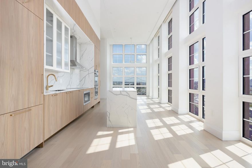 2 Bedroom 2.5 Bath Penthouse w/ Den. Parking Included! The Premier Collection: a selection of newly built penthouse and bi-level townhomes at Piazza Alta, located in the heart of Northern Liberties, one of Philadelphia's most vibrant neighborhoods. These spacious residences feature sleek designs, high-end finishes, and open floor plans that blend luxury with convenience. Each penthouse was designed with majestic 13' ceilings, fluted glass white upper cabinets, pantry cabinet and best-of-the-best panel-ready appliances. Select penthouses include additional kitchen upgrades like multiple dishwashers and built-in double ovens with dual diagonal convection system.

Close to Center City, you'll enjoy easy access to top dining, entertainment, and cultural hotspots, along with world-class amenities that elevate your living experience. It's the perfect balance of urban living, neighborhood charm, and exceptional convenience. Luxury lives here. Pricing and availability subject to change. Photos are of model units. Select units published on Bright MLS are inclusive of current concessions.