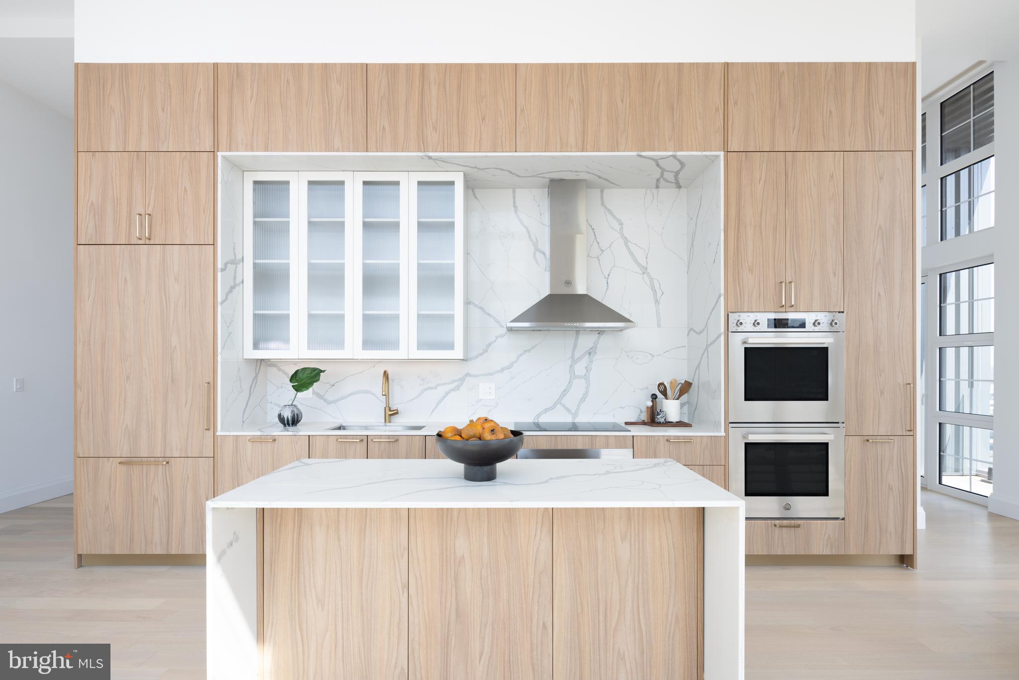 The Premier Collection: a selection of newly built penthouse and bi-level townhomes at Piazza Alta, located in the heart of Northern Liberties, one of Philadelphia's most vibrant neighborhoods. These spacious residences feature sleek designs, high-end finishes, and open floor plans that blend luxury with convenience. Each penthouse was designed with majestic 13' ceilings, fluted glass white upper cabinets, pantry cabinet and best-of-the-best panel-ready appliances. Select penthouses include additional kitchen upgrades like multiple dishwashers and built-in double ovens with dual diagonal convection system.
Close to Center City, you'll enjoy easy access to top dining, entertainment, and cultural hotspots, along with world-class amenities that elevate your living experience. It's the perfect balance of urban living, neighborhood charm, and exceptional convenience. Luxury lives here. Pricing and availability subject to change. Photos are of model units. Pricing inclusive of current offers.