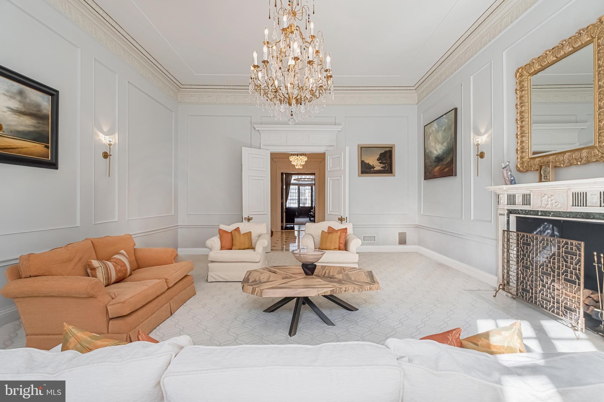 A Home Like No Other!
Situated on the most prestigious block in Philadelphia, this ONE-OF-A-KIND RESIDENCE captivates from the moment you step inside.
Meticulously renovated to perfection, this home offers an unparalleled blend of luxury, sophistication, and value. The striking black-and-white marble entryway, complete with a welcoming reception area and a GRAND STAIRCASE, sets the stage for the elegance that unfolds throughout the home.
Designed for both intimate gatherings and grand entertaining, the chef’s kitchen is a true masterpiece. Featuring CUSTOM CABINETRY, top-of-the-line Miele and Wolf appliances, a breakfast bar, and spacious dining areas, this impeccably planned space exudes refinement and functionality.
Take the PRIVATE ELEVATOR or ascend the dramatic staircase to the extraordinary second floor—truly the crown jewel of this home. A MUSEUM-QUALITY space, where Versailles meets Newport, this level is designed to impress. The formal living room boasts soaring ceilings, a grand fireplace, original restored moldings, and stunning southern exposure.
For a more intimate retreat, the adjacent den is a work of art, featuring rare custom woodwork, an EXQUISITE FIREPLACE, and a stately bar. French doors open to your private terrace, the perfect setting for a morning espresso or an evening glass of wine—easily obtained from your wine cellar.
The world-renowned Yellin-designed staircase leads to the next level of elegance. The Primary Suite is a LUXURIOUS SANCTUARY, reminiscent of a world-class hotel. Bathed in natural light, with 12-foot ceilings, a serene sitting area, a generous walk-in closet, and a spa-like bath, this space is pure tranquility. A second equally grand suite, complete with its own magnificent bath, completes this level.
The refinement continues to the next floor, where two additional spacious bedrooms and elegantly appointed bathrooms provide comfort and style.
But the luxury doesn’t stop there. The top floor of the home is a versatile retreat, featuring an additional bedroom/private office, full bath, and a stunning library. At the heart of this level is the ULTIMATE FAMILY ROOM, complete with a bar and a fully equipped kitchen—perfect for sports enthusiasts, movie nights, or entertaining on a grand scale.
With a PRIVATE TWO-CAR GARAGE, this restored masterpiece is beyond perfect—and of course, just minutes from Rittenhouse Square, the University of Pennsylvania, and Philadelphia’s finest dining and entertainment.
This is more than a home—it’s a statement of ELEGANCE, REFINEMENT, AND LUXURY LIVING AT ITS FINEST.