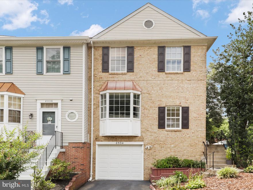 Spacious and inviting end-unit home in a sought-after neighborhood—one of the few with a garage and additional driveway parking! Enjoy great curb appeal and a number of thoughtful updates throughout. The main level features Brazilian cherry hardwood floors and a bright, sun-filled living room with a wood-burning fireplace. The kitchen was fully renovated about five years ago and features modern cabinetry, white quartz countertops, a designer backsplash, and updated appliances.

Upstairs, you’ll find three well-sized bedrooms with plenty of closet space, attractive wood-look flooring, and two updated bathrooms. The finished basement adds a large rec room with a second wood-burning fireplace, laundry area, storage room, and an additional half bath.

Home Facts: Kitchen update 2020, Roof 2019, Deck and Fence 2019, HVAC 2015 and tune-up and serviced 2025. 

Fantastic location—less than two miles to I-95, close to restaurants, shopping, Kingstowne Public Library, Wegmans, and just minutes from Fort Belvoir.

Homes with a garage and driveway don’t come up often in this community—don’t miss your chance!