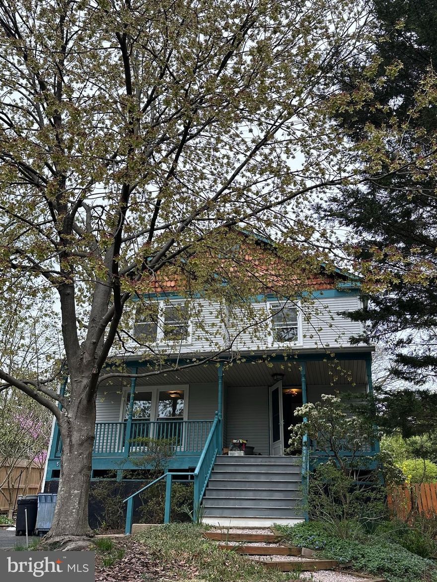 Nestled on a picture-perfect, tree-lined lot in the heart of historic Takoma Park, this beautifully updated home is the rare blend of modern comfort and classic charm. Set back from the road with a lush front lawn and framed by mature landscaping, it offers a serene retreat just half a mile from the Takoma Metro and vibrant downtown.
From the moment you arrive, the home delights with curb appeal—a wide front porch welcomes breezy afternoons with a glass of lemonade, while the custom front door with stained glass hints at the thoughtful details within.
Inside, freshly painted walls and newly refinished solid hardwood floors create a bright, inviting interior. The floor plan flows effortlessly, with generous ceiling height and natural light throughout. The stunning sunroom addition is a true highlight—bathed in sunlight and perfect year-round for morning coffee, quiet reading, or hosting summer BBQs overlooking the sunny deck and expansive backyard.
The main level features a gracious living and dining area, an open-concept kitchen with newer appliances (2023), a center island, ample cabinetry, pantry, and the sweetest breakfast nook. A real entry foyer with built-ins and a coat closet sets the tone for a home that’s as functional as it is beautiful. A versatile bonus room with French doors serves perfectly as an office, guest room, or creative studio, plus a convenient powder room rounds out the main level.
Upstairs offers three spacious bedrooms, a recently updated hall bath, and a large laundry closet for ultimate convenience. The primary suite boasts a stylish private bath and a generous walk-in closet. A fully floored attic provides ample storage or potential for future expansion.
The finished lower level is a true bonus with tall ceilings, two additional rooms (ideal for offices, guest space, or a home gym), a full bath, kitchenette, and its own private entrance—perfect as an au pair/in-law suite, short-term rental, or extended guest space.
Energy-efficient windows, newer systems, and vibrant seasonal landscaping enhance the home’s long-term livability. The driveway offers generous off-street parking, and the yard is both stunning and functional with mature trees, native plantings, and plenty of space to garden, play, or entertain.
Lovingly maintained by the same owner for 40 years, this home has been thoughtfully improved with a kitchen remodel (2015), bathroom updates (2019), and new appliances within the past year. It’s part of a close-knit, welcoming community with neighborhood events, a lively listserv, and short stroll to *everything*: 0.5 mi to Takoma Metro, 0.6 mi to Takoma Bev Co, Spring Mill Bakery, the TP Farmers Market, restaurants, parks, and Takoma Park Schools, and almost built brand new Library! Right down the block from Belle Ziegler Park!
Bonus: this home was a proud recipient of the *Sustainable Takoma* award