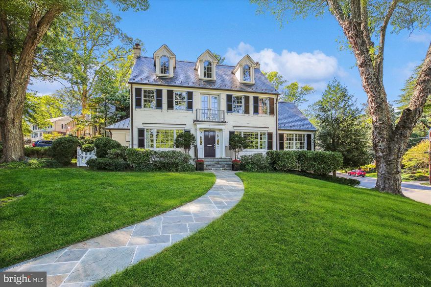 A Hilltop Haven of Unparalleled Design and Quality


Nestled in the heart of Sumner, this stunning home stands as one of the neighborhood's most iconic properties. Designed by Anthony Wilder Design Build, it is a national Chrysalis Award winner for its exceptional whole-house renovation in 2004. This transformation was thoughtfully crafted to improve the home's flow, bring in more natural light, and create an abundance of storage. The integration of the old and new is so well-executed that it feels as though it was always meant to be this way.
The main level is nothing short of exceptional. The chef’s kitchen is a masterpiece, adorned with premium Wood-Mode inset cabinetry, quartz stone countertops and backsplashes, two Miele dishwashers, a Sub-Zero refrigerator seamlessly integrated into the cabinetry, and a built-in Miele Nespresso machine for coffee enthusiasts. Dual-fuel Dacor 48" range which includes two ovens and a six-burner cooktop make it a dream for any chef, while the expansive island offers seating and robust storage. Adjacent to the kitchen is a pantry with customizable and movable shelving for added convenience.
The family room is both inviting and functional, featuring a cozy gas fireplace, custom-built cabinetry with hidden storage, and a cleverly concealed TV mounted on a movable arm. The room is equipped with surround sound, a programmable lighting system, and two ceiling fans, creating the perfect atmosphere for relaxation or entertaining. Just outside, the flagstone patio is perfect for entertaining, with two ceiling fans, outdoor speakers, and lighting to enhance your outdoor gatherings.
A touch of elegance can be found in the formal dining room, which boasts gorgeous glass pocket doors, integrated ceiling speakers, and custom-designed draperies with grass shades. Meanwhile, the living room offers a wood-burning fireplace (re-lined but never used), along with thoughtfully designed draperies and shades that enhance its timeless charm.
The study is a quiet retreat, complete with radiant heated floors, an extended bay window, enlarged front windows, and Brookhaven cabinetry. Integrated sound system bookcase speakers add to the ambiance, making it an ideal space for productivity or relaxation. 
This level also includes a powder room, a functional workstation, and well-designed storage closets tailored for both adults and children.
On the second floor, the primary suite is a true sanctuary. It features vaulted ceilings, custom-built Wood-Mode cabinetry, a Juliet balcony, and a ceiling fan. The en-suite bathroom is equally impressive, offering dual sinks, Travertine stone, ample storage, ceiling heat lamp, and a shower illuminated by a skylight. A laundry room, conveniently accessed via the primary bedroom or the hallway through pocket doors, features a Whirlpool washer and dryer, a built-in ironing board, abundant Brookhaven cabinetry with Corian countertops, and ceiling speakers, making laundry a seamless part of daily living. Two additional bedrooms on this level are spacious and include built-in shelving and abundant storage, with the option to connect them for a shared layout. A full bathroom and a half bathroom with Brookhaven cabinetry and Corian countertops complete this floor.
The third level provides even more flexibility with two additional bedrooms. One is perfectly equipped as an office, complete with a sound system, a ceiling fan, and creative cubby storage under the eaves. The fifth bedroom offers plenty of storage, and both rooms are serviced by a full bathroom with Brookhaven cabinetry and Corian countertops.
The lower level provides additional living space with a recreation room featuring  ceiling speakers, a wood-burning fireplace with a re-lined chimney (never used), and a full bathroom with a wheelchair-width walk-in shower. The utility and work area includes a secondary laundry hookup, a utility sink and updated systems, including a two-zone HVAC system installed in 2020, a new 75 gallon