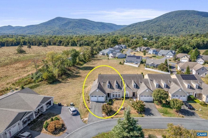 Experience refined living in the coveted Stone Orchard community at Stoney Creek, Wintergreen. This meticulously maintained end-unit retreat offers sweeping mountain and pasture views with a dramatic two-story foyer and living room. The kitchen features stainless steel appliances, wood cabinetry, and granite countertops, while the private main-level primary suite boasts a tray ceiling, dual walk-in closets, and a spa-like bath. A versatile office/den/4th bedroom provides the perfect flex space. Upstairs, find two spacious bedrooms ideal for guests, a full bath, and a loft. Outdoors, relax on the stone patio where rolling pastureland creates a permanent natural buffer?ensuring uninterrupted mountain views year-round. With exterior maintenance and lawn care handled by the HOA, this property is ideal as a primary residence or seasonal getaway. Enjoy an unmatched location: walk to Nellysford?s town hub, farmers market, clubhouse, and trails, with Nelson 151 wineries and breweries, Wintergreen Resort, and Charlottesville just minutes away.,Granite Counter,Wood Cabinets