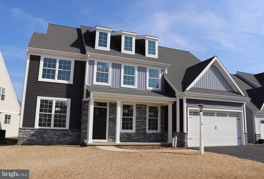 Take a step inside perfection! This beautifully crafted 2-story by Horst & Son Home Builders has so much to offer! A 2-story foyer greets you &  leads you to over 2,750 square feet of living space with 9' ceilings throughout the 1st floor. A sprawling family room with a gas fireplace surrounded by charming built-in cabinets is open to a cook's kitchen with a large center island with prep sink, upgraded countertops & a walk-in pantry with double ovens. You'll also find a formal dining room accented with crown & picture molding, French doors that guide you into a 1st floor office, a mud room with 2 closets & a built-in bench with pegs is conveniently just inside the garage entrance & an oversized deck provides an ideal spot for outdoor enjoyment. The upper level offers an abundance of space where you can escape to your primary suite with 2 walk-in closets, 2 vanities, a beautifully tiled step-in shower with storage niches & vaulted ceilings creating an open & airy feel. 3 additional bedrooms (one with a walk-in closet, a full bathroom with a double-bowl vanity & a laundry room complete the 2nd floor. Other features include a superior wall basement, separate heating/cooling zones for 1st & 2nd floor, tankless gas water heater & a 2-car garage.