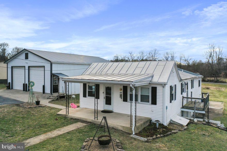 Welcome to 6201 Short St., a charming home nestled in the scenic beauty of Mount Jackson. This property features 3 bedrooms, 2 full bathrooms, and a convenient home office located off the primary bedroom. The updated kitchen boasts granite countertops and stainless steel appliances, perfect for cooking and entertaining. Step outside to find a spacious 30x50 detached garage, perfect for storage, hobbies, or a workshop.  With a brand-new HVAC system, this home combines comfort and functionality in a picturesque setting. Don't miss the chance to make it yours!