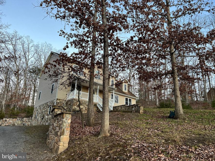 Less than ten minutes from town, this beautiful three story home is waiting for your personal touch to make it your own. Must see to appreciate the spaciousness and the beautiful locally hand picked stone built retaining walls! Sit on the front porch and enjoy the view of farm and valley to the south. Public access to South Branch of the Potomac River less than two miles away. Fishing, kayaking, golfing, skiing, etc. just minutes away!Very reasonably priced for this much house on 3.75 private acres! Along Old Fields Road and no HOA fees associated with being in Tanglewood!