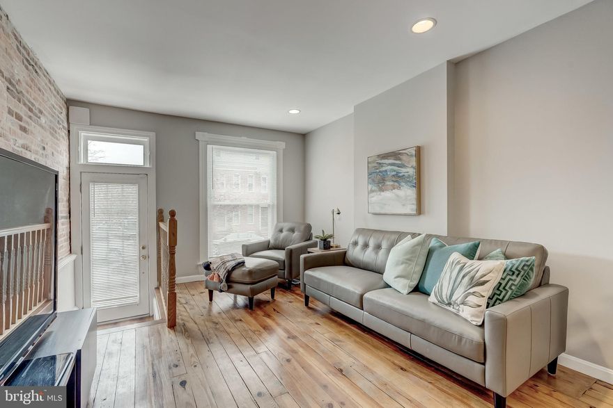 Best Location in Federal Hill - This lovely 2 bed 2.5 bathroom home has everything a savvy buyer wants: STUNNING rooftop TREX deck with the BEST water views, huge fenced yard, Parking LOT - *SELLER IS OFFERING PRE-PAID PARKING FOR 6 MONTHS (this is not a guarantee of a spot* (see details below or call for more clarification), Hardwood flooring, large living and dining room, large kitchen (room for table) with SS appliances, half bath on main level, large master bedroom with en-suite bathroom and a large unfinished basement great for storage. The roof and deck were all replaced in 2016. The HVAC is 2-3 years old. House has been meticulously maintained.  Owner has also installed a security system in the house ($1400 value) that he is willing to include with accepted contract. *two of the photos shown in the listing of the parking lot across the street from the house are of a free, public parking lot (technically classified as a park) - *not* of the lot the seller is offering, which is at 1302 Key Highway (see other photo) Normally, there's a spot open in the lot between 8am to 6pm M-F, and randomly on the weekends.The parking that the seller can secure a 6 month lease for is located at 1302 Key Highway, a short walk from the house. There are two spots currently available -- 8 and 9 -- OWNER CANNOT GUARANTEE THESE WILL BE AVAILABLE - THE SOONER THE BETTER. If no spots are open, seller can credit buyer $720.Schedule your showing today!