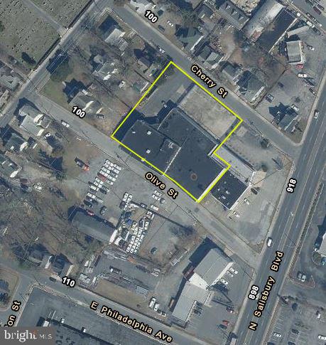 Rare Industrial property comprised of Warehouse and Office. Priced, well below replacement at just $30 PSF. Simply put, you can’t construct this type of building for anywhere near that price. Building has been upgraded with newly renovated office spaces and entry ways, brand new windows throughout, extensive exterior renovations utilizing Aztek, 5 overhead doors ( w/ drive in, 2 dock high), freight elevator and fully fenced in yard. There is also professionally installed low voltage cable plant throughout the complex for telephone, data, CCTV, Wi-Fi and Audio Video. Property is perfect for an investor or owner operator. If you wish to operate your business here, you can enjoy some income to help you offset the mortgage payment. Property is currently producing $54,600 (approx.) in income. The income is generated by 3 tenants who occupy approximately 14,000 of the building. The current owners occupy the remaining 25,000 SF. The current owners have said they would consider a lease back, in the event that an investor purchased the building. This would help give the buyer time to find a tenant for the space. The possibilities are endless for this deal and this building. This type of product is hard to find right now. Sale includes 111 Olive St. and 108 Cherry St.