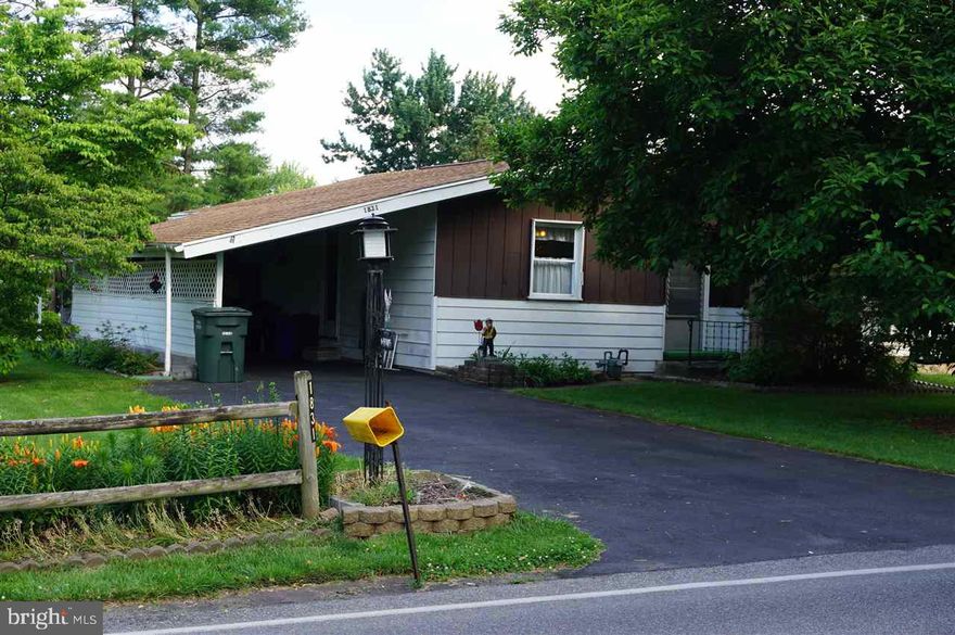 Nice Dover Rancher in Need of a New Owner.  Open Floor Plan with Spacious Eat-in kitchen.  Large Living Room with Stone F/P.  Hardwood Floors with 3 B/Rs and 1 Bath. Basement needs to be remodeled, but has potential to be a Great Family-Rec Room.  Large Sun Room off L/R.  Many Flower Beds, Car Port.  Easy to Build Equity and Have a Nice Home.