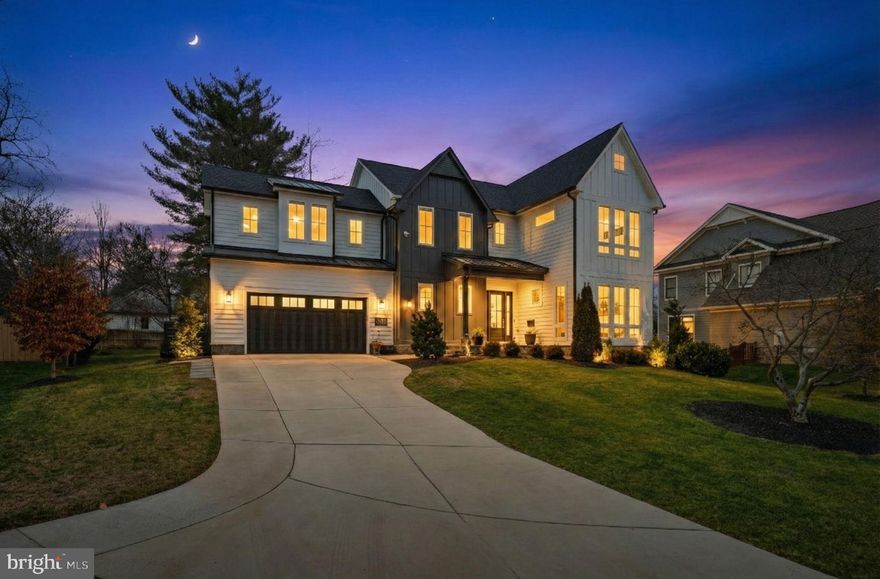 Welcome to 311 Albrecht Circle — a showstopping custom build by Stahl Homes, where luxury living meets effortless comfort just three blocks from Maple Avenue. Nestled on a quiet cul-de-sac, this home is bursting with designer details and crafted by one of the area’s premier builders known for creating spaces made for both everyday living and unforgettable entertaining.
Step inside and you’re greeted by wide-plank light hardwood floors, soaring 10-foot ceilings, and sun-drenched rooms thanks to the home’s east/south exposure. The gourmet kitchen feels straight out of a design magazine: an extra-long Calacatta one-slab island, shaker cabinetry with lighted upper tiers reaching the ceiling, Thermador refrigerator columns, subway tile to the ceiling, a shiplap range hood, pot filler above the coffee station, six-burner stove, double ovens, drawer microwave, oversized stainless steel sink, beverage fridge, and beautifully integrated cabinetry.
The kitchen opens seamlessly to a window-wrapped breakfast room that brings the outdoors in. Dual Andersen sliding doors connect you to a dreamy screened-in porch on one side and a composite deck on the other — perfect for al fresco dining, quiet mornings, or hosting guests with an effortless indoor/outdoor flow.
The adjoining family room is equally inviting, featuring a gas fireplace with marble tile surround, custom built-ins, and oversized windows with transoms that flood the space with natural light. This level also includes an expansive pantry, a mudroom with custom built-ins, a stunning designer powder room, and a large office with floor-to-ceiling windows and an accent wall that makes working from home feel anything but ordinary.
Upstairs, you’ll find four generous bedrooms and a conveniently located laundry room. The primary suite overlooks the backyard and offers tray ceilings, two custom walk-in closets, and a spa-inspired bathroom that feels like a luxury retreat. Enjoy heated herringbone floors, double marble vanities (one with a dedicated makeup vanity), orb pendant lighting, a massive frameless glass shower, water closet, and private linen closet. Each additional bedroom features a walk-in closet and its own uniquely styled en-suite bathroom, giving every space personality and comfort. The upper-level laundry room features Electrolux front-load washers, hanging space, a sink, cabinetry, and leathered granite countertops.
Even the walk-down to the lower level is filled with natural light. Here, a large recreation room opens to a stylish wet bar with beverage fridge, sink, granite counters, floating shelves, and a glassware organizer — ideal for movie nights or hosting friends. This level also includes a fifth bedroom with a large egress window, a full bath, a walk-in closet, and three additional storage rooms perfect for seasonal décor, a workshop, or a future wine cellar. Storage in this home is truly next-level.
The oversized, insulated, heated two-car garage includes mounted storage, and the home even comes equipped with a generator — an incredible bonus. Sitting on a flat, .28-acre premier lot, the backyard is perfect for play, entertaining, or simply enjoying the outdoors.
Located on a cul-de-sac and zoned for Thoreau Middle and Madison High, this home offers the best of Vienna living. You’re just a short stroll to Whole Foods, South Block, the newly renovated Vienna Community Center, Vienna Inn, shops, restaurants, and more. Hop on the nearby W&OD Trail for a scenic ride or run stretching from Arlington to Loudoun County. Commuters will love being only 2 miles from the Vienna Metro and minutes to D.C., Arlington, and Reston.
From lively community events like the Halloween Parade and Viva Vienna to top-rated schools and endless local charm, 311 Albrecht Circle delivers luxury, lifestyle, and location all in one beautifully curated home.