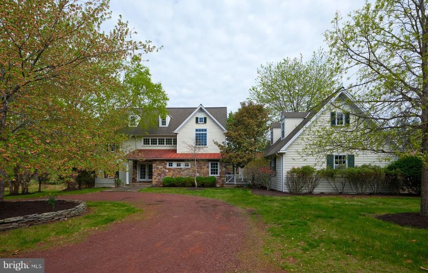 Welcome to 393 Hollow Horn Rd, " Piper's Peak".  First time on the market, this magnificent custom built home set among the rolling hills and open space of Tinicum Township, is an oasis from the busy world.  The main floor offers a sun filled open floor plan, floor to ceiling fieldstone fireplace, hardwood floors, ceramic tiles and custom built in bookshelves. The chef style eat-in kitchen is anchored by an expansive granite counter island with bar top and built in gas cooktop, and prep sink.  The custom maple cabinetry with matching paneled appliances, recessed lighting and rustic tile backsplash complete the kitchen. There is a main floor office with custom built-in shelves, custom trim work and view from each window. The main entry flows seamlessly into the main living space and music conservatory. The upstairs features sumptuous primary suite with walk-in closets, large master bath with walk in shower & jetted soaking tub, & Juliet balcony. There are two more generous bedrooms and well appointed full bath as well. The  finished daylight lower level with bedroom provides wonderful additional space for entertaining or a dedicated media room. There is also ample unfinished storage. The three car detached garage with overhead breezeway to the house offers plenty of room for storage and vehicles. Step out of the French doors of the kitchen to comfortable covered porch and onto the expansive keystone patio overlooking the in-ground pool. The property is surrounded by a mature landscape of evergreens and ornamental plantings.  Just minutes from rt 611, 32, 113 & 412.  A short drive to Frenchtown, Milford & Doylestown. 90 minutes to Manhattan and easy access to the Delaware river. The serenity of upper Bucks county awaits. Schedule your tour today.