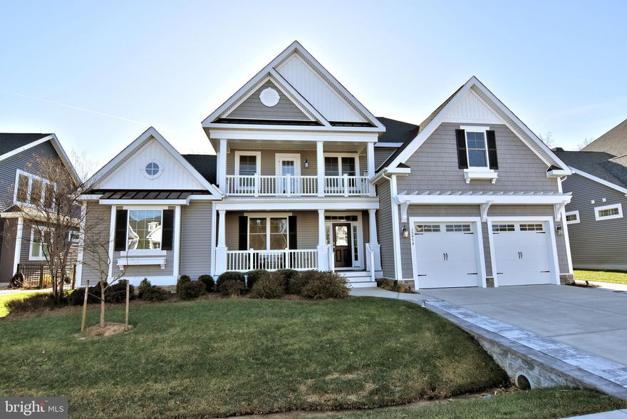 Custom-built home with an expansive living area on the main floor. Approximately 5,000 square feet of living space. Experience luxury living at its finest with this stunning home, boasting exquisite high-end furnishings and decor. 
Offering a perfect blend of comfort and sophistication for those with discerning taste. This home is being conveyed fully  furnished and is move-in ready, providing a seamless transition for the new owners.   An additional 250 square foot attached screened patio offers access from the patio and the primary suite. Automated landscape lighting front and back (dusk to dawn) Property is completely fenced (black wrought iron) with gates on each side. Back yard can accommodate a large pool. Totally private- behind the house is a large preserve .Five bedrooms all with large walk-in closets and ensuite bathrooms. Five bedrooms  with the Powder room near the kitchen. Walk in pantry. Large laundry room with full size washer/Dryer. Custom kitchen with lighted upper cabinets. Gas stove Custom Built in bar/service wine storage in dining area. Custom two story stone fireplace in the great room with built in display shelves and lighted display cabinets on both sides of the fireplace. Guardian alarm system with remote access. Expanded two car garage (insulated) with resin floor and deep sink. Full size Refrigerator/ Freezer in garage. EV charging outlet in garage. Sunroom off the dining area. Flex space/Office first floor with double
 Glass French doors. Three bedroom suites two downstairs and one upstairs. Primary and second owner suite are on the ground floor. Primary bedroom has his and hers custom walk-in closets with built in  drawers. Two separate  vanity areas, linen closet, private  water closet, large shower. Custom upholstered window seat with storage. Outside door opens onto a spacious screened  patio with custom sliding windows which can be closed in the winter. Third suite is on the second floor, Huge sitting area with sofa. ensuite  bathroom with double vanities and large shower. Two additional spacious bedrooms upstairs with  full baths  and walk-in closets. Large finished storage closet off the upstairs loft-can be customized to suit. Hunter Douglas shades throughout the house including electric  shades in great room and sunroom. Custom pavers on driveway and walk on side of house to the enclosed outdoor hot/cold shower/ changing room. Patio has built in barbecue and granite countertop service area with space for bar stools. 54" round Fire pit in open patio  area. New HVAC system. Two tankless hot water heaters.  HOA fees include all lawn maintenance  and sprinklers including the water for irrigation. Clubhouse and community pool, fitness center, pickleball and tennis courts. Gated community- Sawgrass North. Minutes to beautiful Rehoboth Boardwalk and beaches great shopping and restaurants.