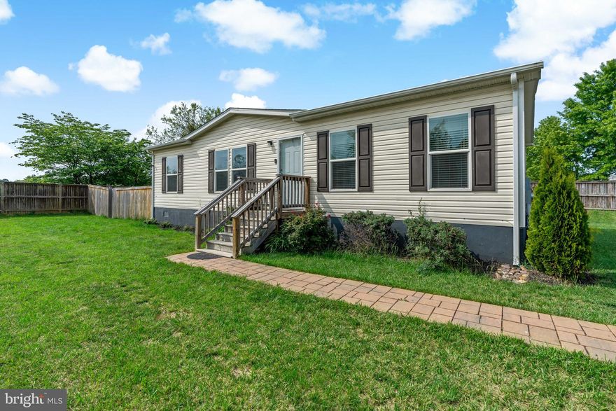 MULTIPLE OFFERS RECEIVED HIGHEST AND BEST DUE 5/15 by 9pm. Move in ready 2019 built double wide home on permanent foundation. This house features 3 Bedrooms and 2 full baths. Large family room with built in cabinets, modern designed kitchen with pass-through to family room, and fenced in yard. Primary bedroom has a walk in closet and spacious primary bath. Not too many detached homes under $200k. Schedule your showings today!