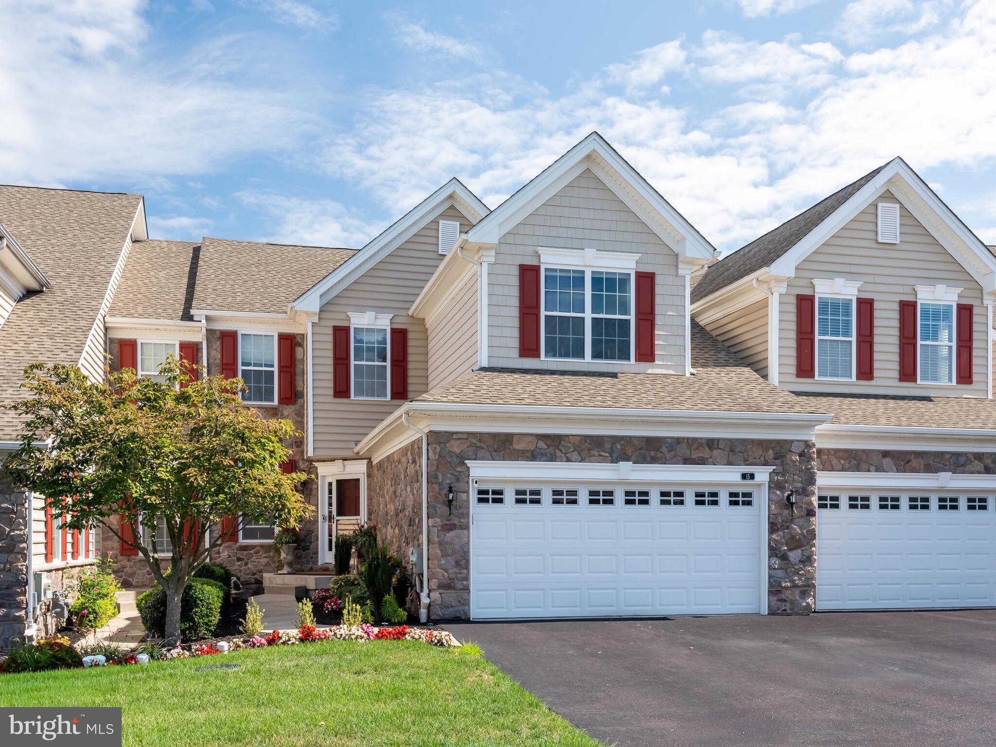Open house: Friday, Sept. 19th, 4:00-6:00. Saturday, Sept. 20th, 2:00-4:00. Welcome to 15 Iron Hill Way, 3 bedroom/3.5 bath townhouse. Features a main level Primary bedroom, finished basement, deck overlooking the green space- common area. This is a beautifully upgraded townhome in the community of White Springs at Providence. With nearly $140,000 in thoughtful improvements - post construction. This three-level townhouse blends modern style, comfort, and convenience for turn-key living.On the main level, pristine hardwood flooring throughout the open floor plan. As you enter the home into the foyer, to your let is the dining room and to your right is the dramatic staircase leading to the upper level. Straight ahead you approach the gourmet kitchen which features white cabinetry, granite counters, custom tile backsplash, stainless steel appliances – with a professional Wolf cooktop (2015, $4,500). The family room features a wall of windows, with a gas fireplace with an elegant stone and wood surround. The family room opens from the kitchen and flows right out to the private back deck – a perfect space for barbequing and sipping your favorite beverage…all while enjoying and relaxing with views of the “green space” from the back of this townhouse. On the main level, the primary bedroom is elevated by enjoying views of the backyard, and a large primary bathroom and closet. The primary bathroom features a large glass enclosed stall shower, dual sinks, custom cabinetry, and a large soaking tub. The large walk-in closet features a custom California Closets system (2019, $5,500) and hardwood flooring (2019, $1,500). Still on the main level, the laundry room/mudroom is fully updated with a new washer (2024, $1,150) and dryer (2024, $1,250). Right next to the laundry room is the half bath and the door to the oversized 2-car garage. The garage floor has been finished with epoxy (2022, $300), features custom California Closets pantry cabinets (2019, $2,750), Gladiator cabinets (2019, $2,200), a refrigerator (2019, $750), and a dedicated car vacuum system (2022, $150). Upstairs, the loft is a flex room for relaxing and was also upgraded with hardwood flooring ($3,500). This second level space also features two additional bedrooms and a full bathroom. The finished basement (2022, $100,000) is a standout, offering a third level of living space. Complete with a custom wet bar featuring quartz counters, custom cabinets, luxury vinyl flooring, custom lighting, a full bathroom. Additional features include ample storage and a battery backup for the sump system and an egress. Community amenities abound, including a pool, tennis courts, clubhouse fitness center, bocce courts, playground, and walking trails. Situated in Upper Providence Township and within the desirable Spring-Ford School District, this home offers an unbeatable location. It’s close to Providence Town Center with Wegmans, restaurants, and a movie theater, and just a short drive to the vibrant nightlife of downtown Phoenixville and King of Prussia, as well as major roadways. With its extensive upgrades and carefully designed spaces on all three levels, 15 Iron Hill Way offers turnkey living and a home that truly stands apart. Welcome home…