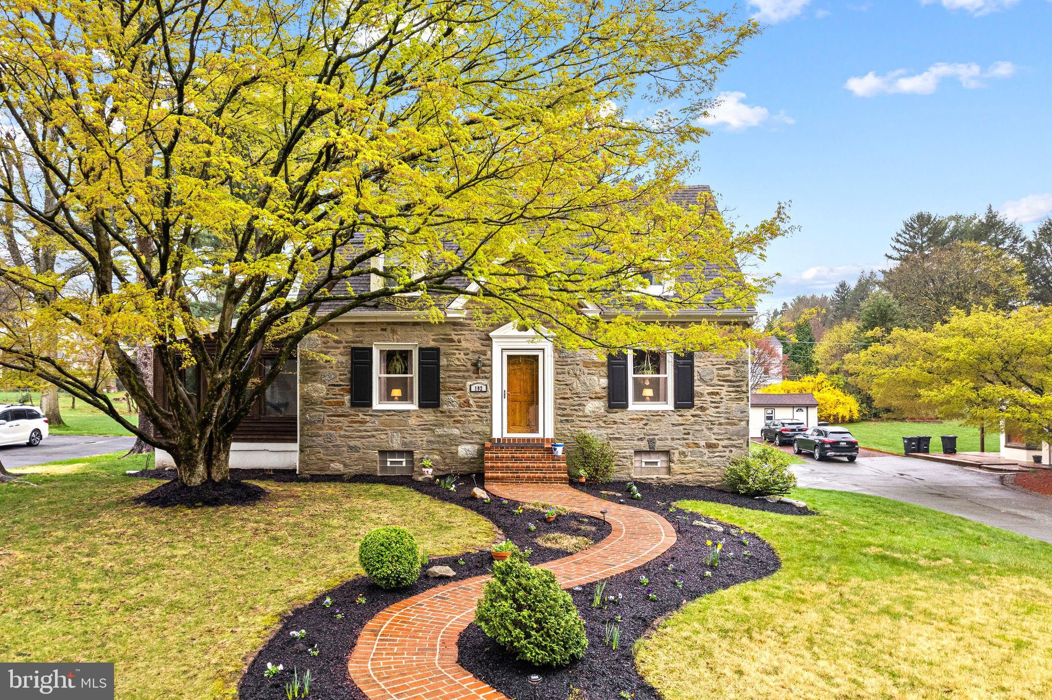 Welcome to 192 Ely, a spacious home nestled in the highly sought-after Lower Moreland School District! This charming residence was meticulously maintained by the owners, and is located on an oversized half acre lot with plenty of outdoor space and 2 attached garages. Enter the first floor of this colonial home boasting refinished hardwood floors, large living room w/ fireplace, sunroom, formal dining room, powder room, and kitchen featuring stainless steel appliances, tile floor, and wood cabinetry. The first floor also features a bonus family room with exposed brick wall, propane fireplace, and sliding glass doors that exit to your rear patio. Continue upstairs where you will find 4 bedrooms, each with ample closet space, and 2 full bathrooms. The bathrooms were recently updated with custom tile work, new vanities, mirror and light. The basement is finished, has a dedicated laundry area, plenty of storage closets, one cedar closet, and a walk out exit to the rear driveway. The back patio is perfect for enjoying morning coffee, dining outdoors, entertaining guests, and evening relaxation. The heart of the home flows with generous living space, and ample amounts of natural sunlight. With so many possibilities for landscaping or recreational activities, this backyard is a canvas for your imagination. Roof was recently replaced as was the heating and central air conditioning unit! Don’t miss the opportunity to make this unique home your own!