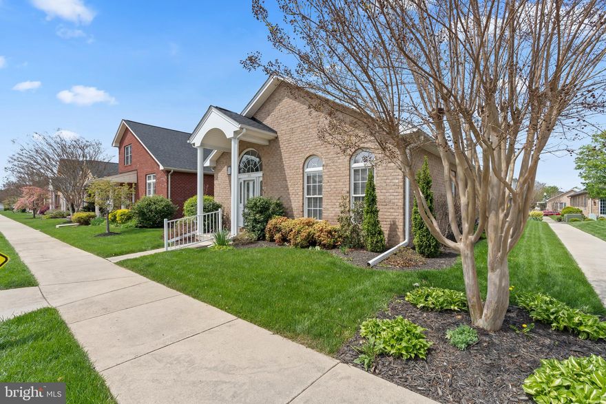 WELCOME HOME TO BEAUTIFUL AND DESIRABLE GREENWICH PARK!  The living is easy and convenient in this lovingly cared for one owner all brick end unit with great curb appeal.  2 bedrooms, 2 full baths, entry foyer with Palladian window and flanked with 2 coat closets and 2 interior columns which flows to open floor plan starting with beautiful, vaulted ceiling formal living room: formal dining room with 2 Palladian windows and an oak kitchen with island and lots of cabinet space.  Primary bedroom includes walk in closet and primary bath with double vanities and a custom-tiled walk-in shower; laundry is located in hallway off 2nd bedroom and 2nd full bath.  A definite focal point is the rear sunroom with sliding atrium doors which open to large concrete patio with awning.  There is alley access to an over-sized 2-car garage which has pull down stairs to storage above.  HOA provides snow removal, grass cutting, weeding, fertilizing, window washing once a year, and trash removal.  Fabulous community with sidewalks and a public park area with gazebo, plus a beautiful fountain at the entrance of subdivision.