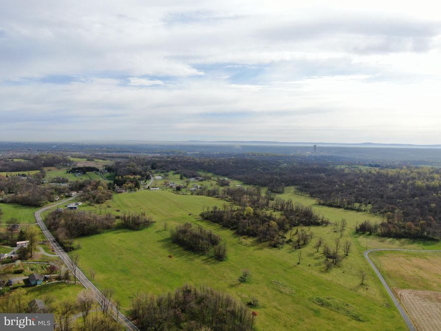 COME AND MAKE THIS PROPERTY YOUR OWN PRIVATE OASIS! These beautiful 131.13+- Acres will be offered in 3 tracts, combinations of tracts, and as a whole! The property is located approx. 2 miles from I-81 exit 12, and approx. 1.5 miles from I-81 exit 8 Tabler Station Rd. This incredible property has approx. 53 acres fenced with high tensile fencing as well as multiple cattle waterers. Approx. 45 acres tillable with Hagerstown Limestone and funkstown silt loam soils! Beautiful wooded acreage on the property has mature timber and tons of wildlife! This property is a perfect chance to own your own piece of heaven far enough away to be private, but close enough that all your amenities are within 5 minutes! All 3 parcels will be perced prior to the auction! 
Tract 1: 42.67+- Acres with tillable acreage, fenced pastures, and wooded ground with tons of wildlife! Road frontage with a proposed driveway entrance off of Apple Harvest Dr. 
Tract 2: 65.18+- Acres with tillable acreage, fenced pastures, and wooded ground with tons of wildlife! Road frontage and a proposed driveway entrance off of Apple Harvest Dr. 
Tract 3: 23.28+- Acres with tillable acreage, fenced pasture and road frontage and a proposed drive way entrance off of Apple Harvest Dr. 
This truly is a once in a lifetime opportunity to own a piece of paradise! Settlement is contingent upon subdivision approval. This property will be offered at auction on Friday, May 17, 2024 @ 3:00PM.