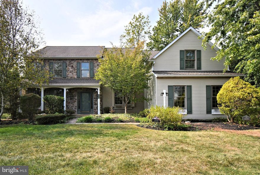 Welcome to 2234 Locust, located in the highly desirable Milestone Community.
This stunning 3,829 sq. ft. home truly has it all. LOCATION and GOOD BONES
Step onto the inviting covered front porch and into the impressive two-story foyer with  hardwood floors. To your left and right, you’ll find a sun-filled formal dining room and living room—perfect for entertaining.
The heart of the home is the renovated kitchen (2023) featuring granite countertops, medium cherry cabinetry, a spacious island, stainless steel appliances, and abundant storage. The kitchen opens directly into a dramatic family room with cathedral ceilings, skylights, and a gorgeous wood-burning fireplace. Off the kitchen, a flexible bonus room awaits—ideal for an office, playroom, or craft space. A dedicated laundry/mudroom and convenient powder room complete the first floor.
Upstairs, the owner’s suite offers a private retreat with a sitting area, walk-in closets, and an ensuite bath. Three additional large bedrooms, each with ample closet space, share a generous hall bath.
The unfinished basement and three-car garage provide incredible storage options. Outdoors, enjoy the beautifully designed paver patio (2022) and refreshing in-ground pool—perfect for summer gatherings.
Recent updates include a new gas furnace (2019) and a roof replacement (2013), offering peace of mind for years to come.
All of this is set within the award-winning Methacton School District, with easy access to Merrymead Farm, Fischer’s Park, Skippack Village, and major routes (476, 73, and 202).
Don’t miss this opportunity to make 2234 Locust your dream home!