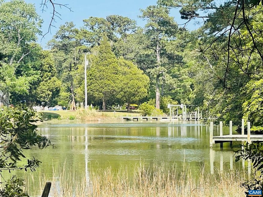 With frontage along Miles Creek, this beautiful waterfront parcel offers 10+ acres, privacy and a serene, park-like setting. State road frontage creates ease of access to the land. Possible division rights make this a truly special listing especially adjacent to a lovely pecan farm. Miles Creek offers 4+ M.L.W. with easy access to the East River and Mobjack Bay. Electric on property, completed soil study completed for septic, and parcel has a deeded right of way on Pecan Lane. Price includes a to be built dock.  Downtown Mathews is a short 12 - minute drive and Gloucester a 15 - minute drive.