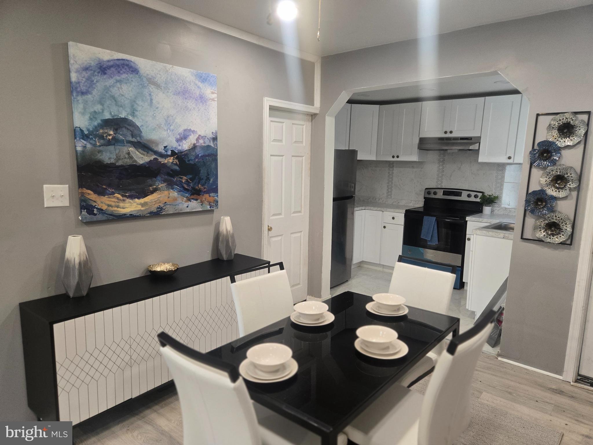 Perfect for an Investor looking for a furnished turn-key opportunity. This is also a perfect starter home as well.
Welcome to this bright and beautiful home. This newly renovated cozy 2 bedroom home boasts a brand new kitchen and bathroom. The kitchen has bright white cabinets with matching tiles in the bathroom and living room accent wall. This home is fully furnished with two generous sized bedrooms with carpet throughout 2nd floor. There is also new flooring throughout the 1st floor as well.
The open concept compliments a seamless flow of space. There is an unfinished basement with washer and dryer. Carpeted steps and front porch to enjoy outside weather. There is also a small fenced in rear yard as well.
Embrace the beauty of this updated modern home. Schedule your showing today!