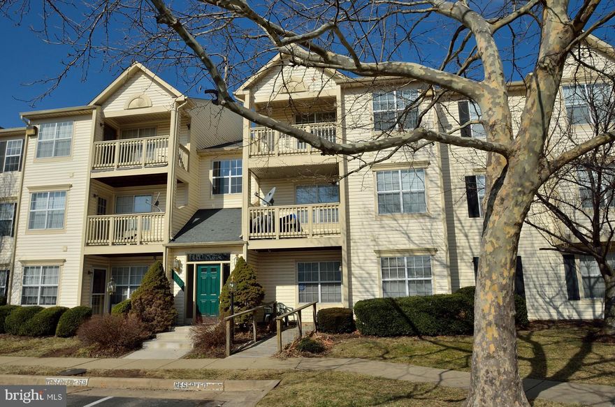 Spacious top floor unit with balcony, living room with gas fireplace and cathedral ceiling, separate dining, master bedroom with cathedral ceiling, full bath and walk-in closet.  Second bedroom features dual access full bath.  Separate laundry room, (2) ceiling fans, water heater approximately 3 years old, washer/dryer approximately 4 years old, gas cooking, newer refrigerator.  Tasteful decor.