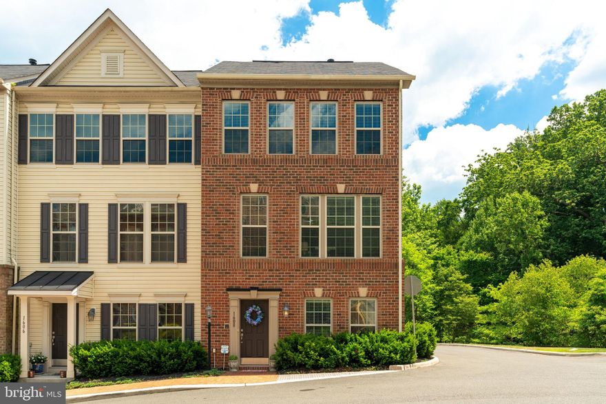 Beautiful end unit town home in the heart of Occoquan.  Former DR Horton model home with all the bells and whistles!  Home is beautifully presented and features:  wood floors, custom paint, upgraded cabinets, speaker system throughout all 3 levels,  intercom, spacious owner bedroom with luxury bath and walk-in closet, bay window with lots of light, tankless water heater, upsatairs laundry, custom blinds on all the windows, 2 car garage and more .  This home is located steps away from everything the little town of Occoquan has to offer.  Don't miss this beautiful home ready for new owners.