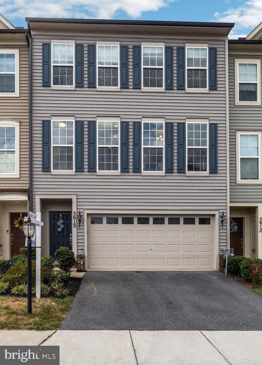 Stunning and spacious townhome with attached entry-level 2-car garage and 2-car private driveway. This particular Parkvue model by Miller and Smith offers over 2400 finished square feet and backs to Pinecliff Park/Woodlands. The characteristics include but are not limited to gleaming modern hardwood floors, open floor plans, large windows for natural lighting, recessed lighting, and 9' ceilings. The kitchen is the heart of this warm home with bright white cabinetry, stunning tile backsplash, stainless steel appliances, and an oversized Quartz Countertop island. The main level also features a grand Family Room with a separate Dining Room, half bathroom, pantry, and coat closet located off the kitchen, and all are ready for you to entertain family and friends. Upper level has 3 generous-sized bedrooms. The Huge Primary Bedroom/Suite has an attached bright bathroom with a dual vanity and a large tile shower. Lower level has an additional full bedroom with a full bath and the perfect rec room or second family room with a walk-out to the fenced backyard and patio. Backyard tree line provides privacy and is only steps away from the neighborhood pool, the trails to Pinecliff Park, and the Monocacy River. Offers an abundance of green space for all your relaxation needs. This absolutely fabulous townhouse in the gorgeous planned community of Tallyn Ridge is minutes from all local commuting routes, the Marc train, downtown Frederick, and all shopping areas.