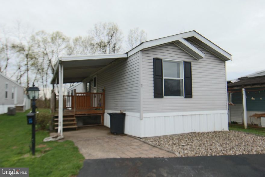1998 Singlewide in King’s River Haven Mobile Home Park Bainbridge located between Middletown and Columbia in Conoy Township within Elizabethtown School District. Two spacious bedrooms and two full baths. Primary bedroom suite at one end and second bedroom and bath at the opposite end of home which is ideal for roommate or adult child. Park rent is currently $420 monthly and included water, sewer and trash. Kitchen with center island, dining area, gas range, refrigerator and full-size washer and dryer. New carpet in living room hallway and front bedroom. Covered deck, off street parking and close to river trail and boat launch. Time to make your move!