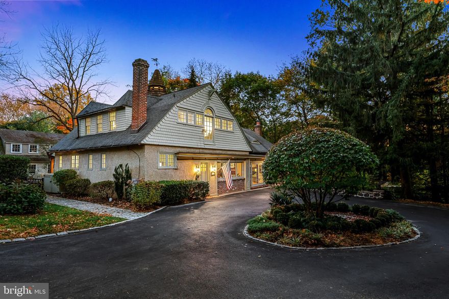 SELLERS COMPLETED A MAJOR IMPROVEMENT CONNECTING TO PUBLIC SEWER AS OF 10/2023!

One-of-a-kind Walk-to-Wayne home at 205 Saint Davids Ct. An exquisite hidden gem set back on a tranquil, private cul-de-sac in the prestigious South Wayne Historic section of the Main Line. This Horace Trumbauer designed 4-bedroom, 2.5-bathroom carriage home built in 1896 with a first floor primary suite has been meticulously updated and maintained, offering the most perfect blend of contemporary amenities and upgraded utilities for maximum comfort and ease of living with classic elegance and character. All within a short walk to the restaurants/boutiques of downtown Wayne and the St. Davids train station. Enter the main door just past the foyer of this home and fall in love with the fully renovated, white chef's kitchen featuring pristine modern white quartz countertops, an abundance of custom cabinetry for storage and high end appliances, including an induction cooktop.  The kitchen island has additional storage space and serves as a central gathering point leading seamlessly to a private backyard through a set of double glass sliding doors where you'll find an expansive deck, flat yard plus fire pit area, within a fenced-in area perfect for outdoor gatherings or relaxation. Conveniently located off the kitchen is a sleek and purposeful laundry room/mudroom with extra storage, adding to the convenience of daily chores. Separate access to the backyard via a stone stepping path leading to the yard and large shed can be found here too. Just past the kitchen’s breakfast bar, the main level boasts a spacious dining area perfect for more formal dining. The dining area overlooks an expansive living room with original wood accented walls and double glass sliding doors and abundant windows allowing for natural light to fill this home. The living room, complete with a wood-burning exposed brick fireplace and flanked by built-in custom bookshelves, provides the perfect backdrop for this enticing and welcoming space.
A first-floor primary bedroom offers a private, retreat-like atmosphere, with a beautifully renovated ensuite bathroom with double vanity, white tiled floor and a glass shower. All bathrooms have been tastefully redone and renovated to reflect contemporary design. Attention to detail is evident throughout the home. A custom built cubby lined foyer with storage drawers and a powder room tucked opposite the stairs to the second floor round out the first floor adding to the expert use of space throughout.
Upstairs, a large, bright den, under a glass-paned spire and oversized windows which offer beautiful views of the circular driveway below, provides additional flexible space to relax/work. A renovated full bathroom with a tub on this level showcases modern details with white tile and modern finishes. Three additional spacious bedrooms with big, oversized windows looking out onto an expertly manicured yard complete the second story which offers ample space for family members or guests. This approximately 3,000 square foot has been updated to include: 2 Trane Electric Heat/AC Pumps Systems (2014), new electrical panel (2014) with surge protectors, new IPE Deck and Sonos installed Sound System in Kitchen, Living Room and Deck (2015) and fully painted exterior including trim (2021), to name a few. Pre-listing inspection report available in the documents section. The picturesque cobblestone detailed circular drive enhances the curb appeal of this property which provides easy access to/from St Davids Ct. Conveniently located under 2.5 miles from Villanova and minutes to the R5 train to Philly, I-476/I-95. Don't miss the opportunity to own this exceptional carriage house, offering both comfort and style in a prime location. Come experience the true beauty and tranquility this home has to offer including Award winning Radnor Township schools and the warm sense of community in historic downtown Wayne. Call agent to show, still quietly listed.