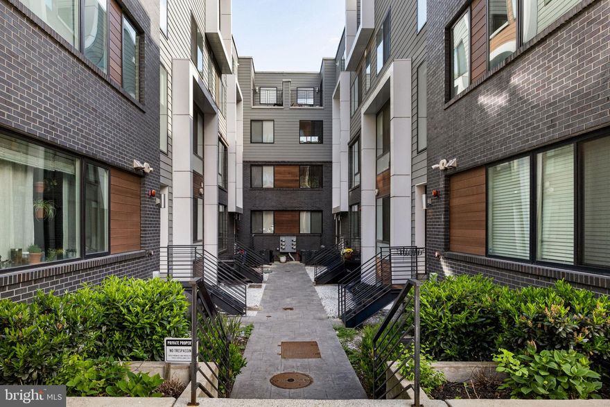 Tucked away in the heart of Fishtown, 1647 E Eyre Street, #6 offers an exclusive retreat within a vibrant community. This tri-level PENTHOUSE condo is thoughtfully designed for modern living, combining style, convenience, and privacy. Step inside to a bright and spacious living area, where oversized windows flood the space with natural light. The sleek two-tone kitchen cabinetry, stainless steel appliances, and open-concept dining area create the perfect setting for entertaining. On the second level, you'll find two generously sized bedrooms, a full bathroom, and a convenient laundry area, all bathed in natural light. The third-floor owner’s suite is a private sanctuary, featuring a walk-in closet, a spa-inspired four-piece bathroom with a free-standing soaking tub, and an exclusive balcony. Just outside the suite, a built-in bar awaits, ideal for a morning coffee station or evening cocktails to enjoy on your expansive rooftop deck with city views. This home is loaded with upgrades, including custom accent walls, designer lighting, and a high-end security system.  Don’t miss your chance to own this incredible home in one of Philly’s most sought-after neighborhoods. Several years of tax abatement remaining! Schedule your private tour today!